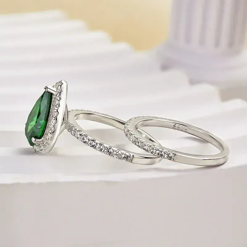 Classic 2.2ct Emerald Green Halo Pear Cut Wedding Set In Sterling Silver
