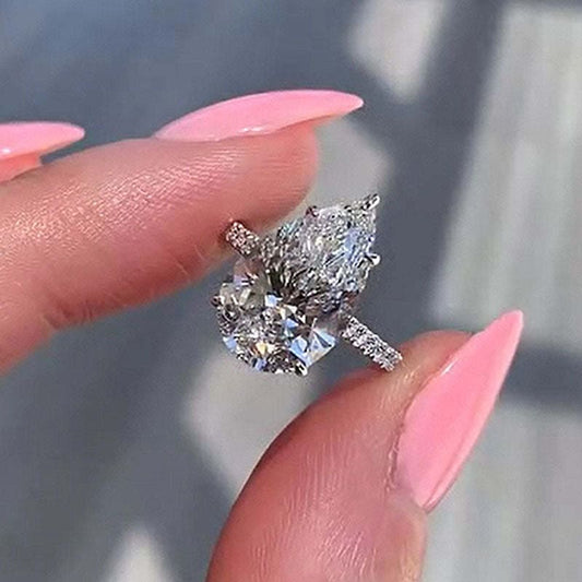 Hidden Halo Pear Cut 4.5ct Engagement Ring In Sterling Silver