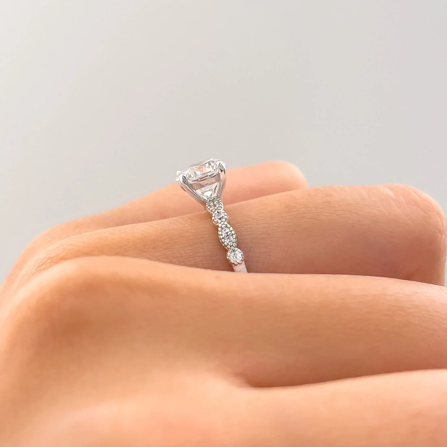 Lustrous Round Cut 1.2ct Pave Engagement Ring In Sterling Silver